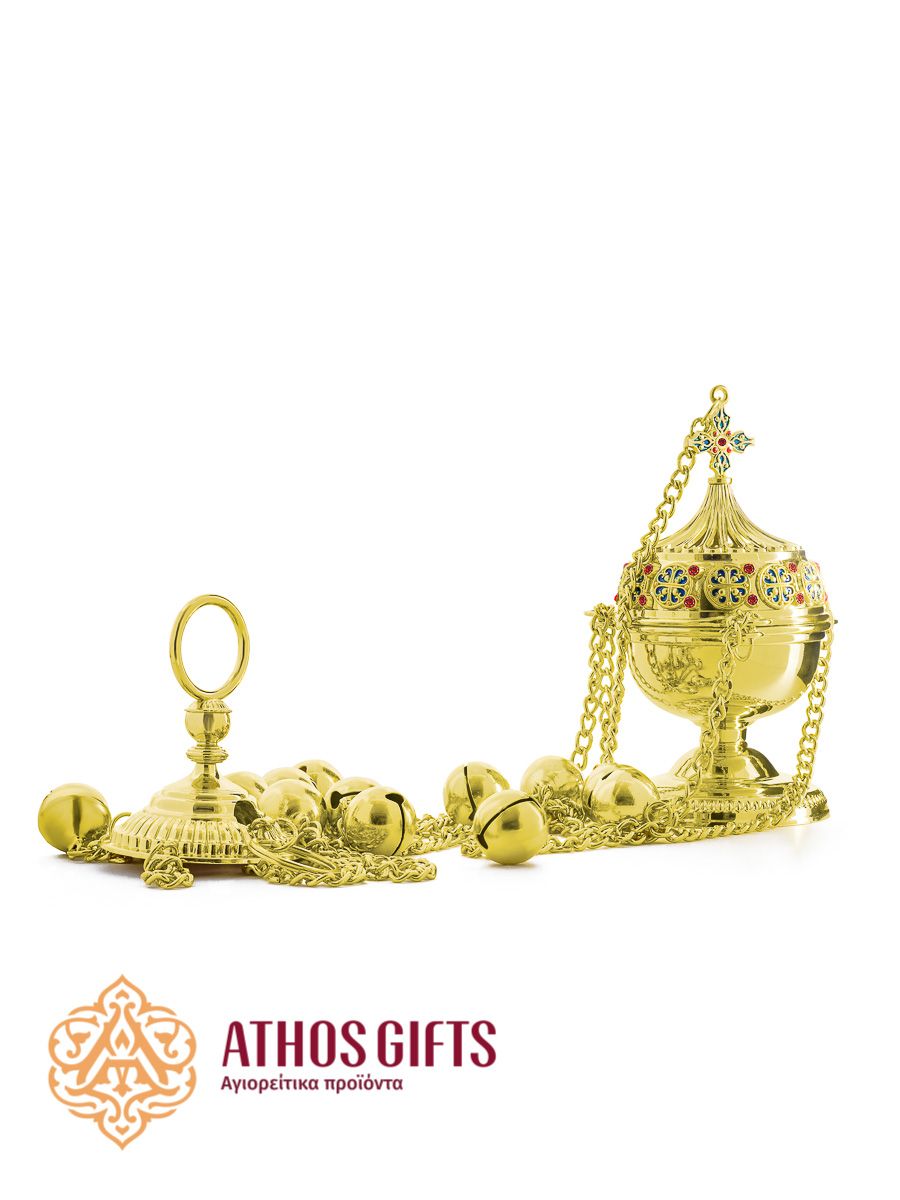 A gold-colored censer for incense.