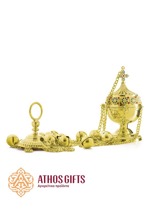 A gold-colored censer for incense.