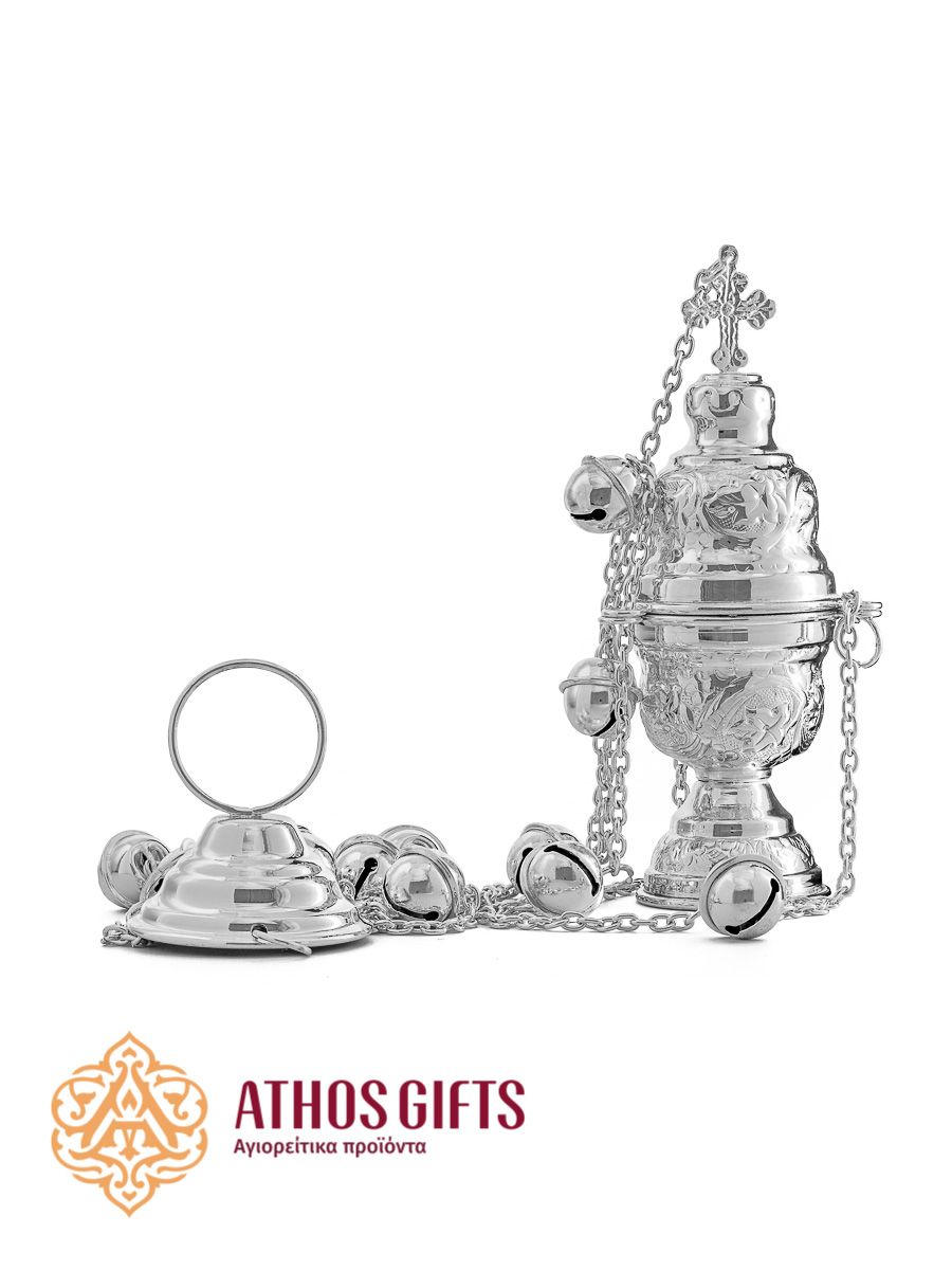 A silver-colored censer for incense.