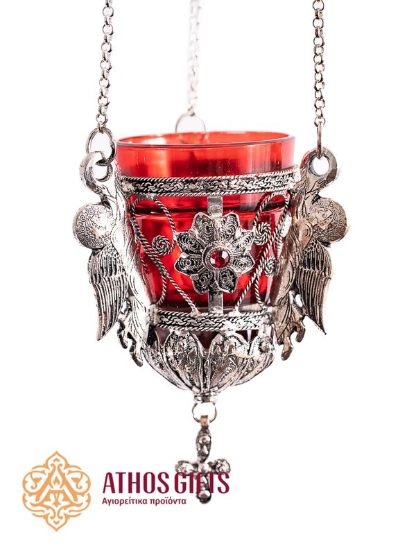 Hanging vigil lamp made of red glass in a carved metal frame
