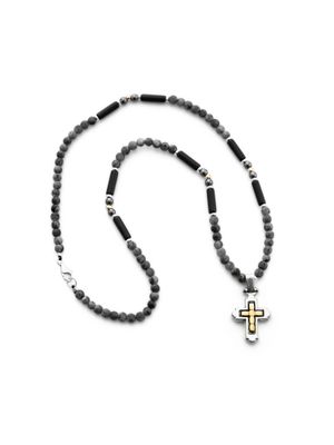 Necklace made of labradorite with a silver cross.