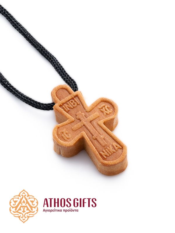 A wooden pectoral cross on a cord, handmade on Mount Athos.