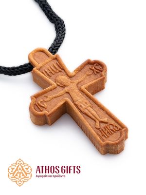 A wooden pectoral cross on a cord, handmade on Mount Athos.