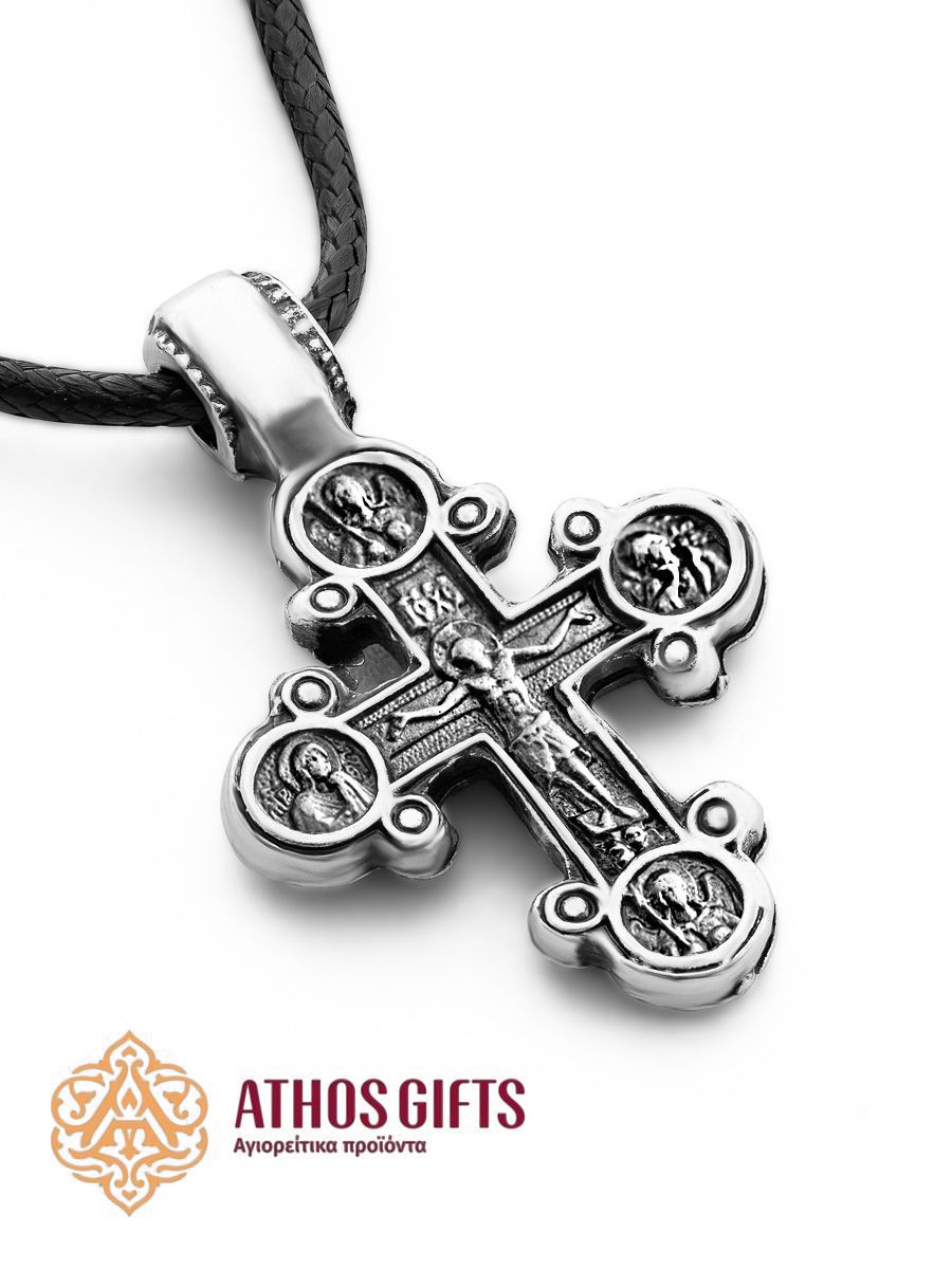 Metal cross with images of the Crucifixion and the Mother of God with Jesus.