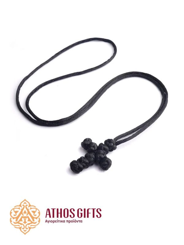 Children’s cross for baptism, braided from a single-colored cord