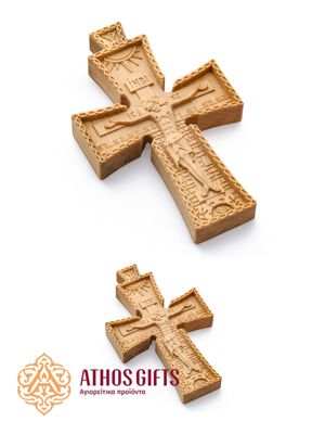 The hand-carved wooden cross is handmade by monks of the Holy Mountain Athos.