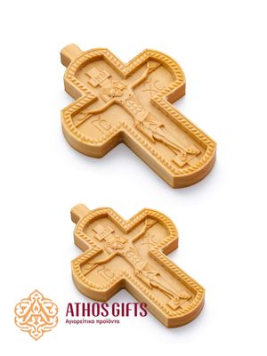 The hand-carved wooden cross is handmade by monks of the Holy Mountain Athos.