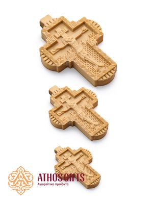 Hand-carved wooden cross with the image of the Crucifixion of our Lord Jesus Christ.