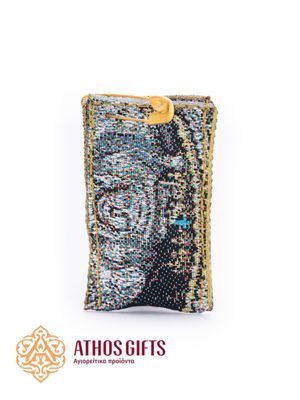 A fabric amulet with the image of Saint Archangel Michael.