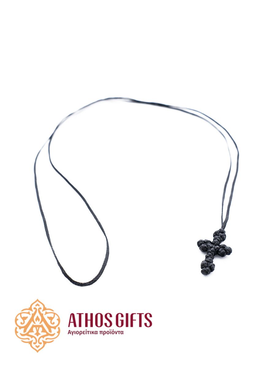 Children’s cross for baptism, braided from a single-colored cord