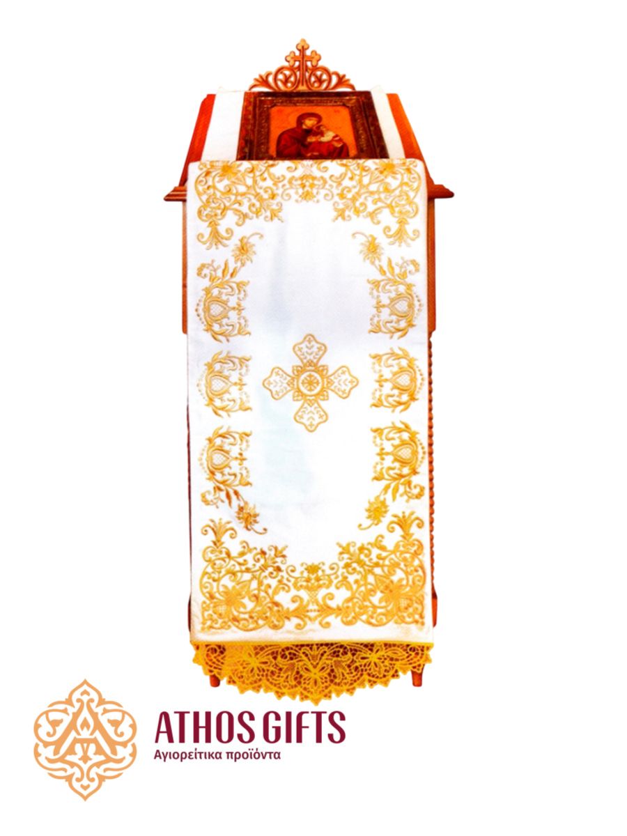 Decorative cover for an analogion made of white cotton satin with gold embroidery.