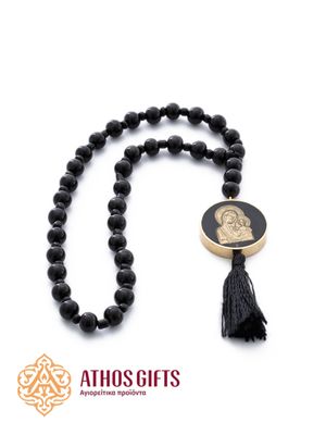 Rearview mirror pendant for a car with a relief metal image of the Mother of God holding the Infant Christ