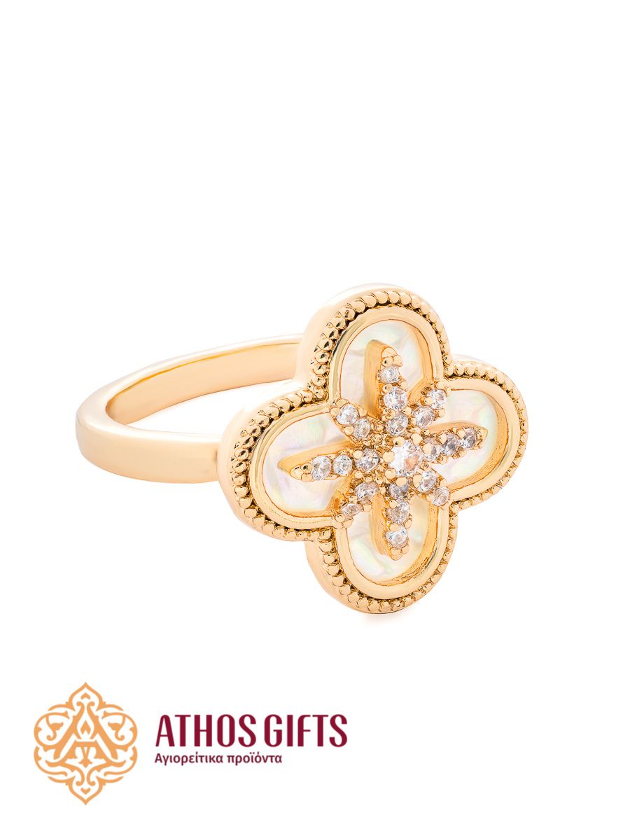 Ring with mother-of-pearl and glass rhinestones.