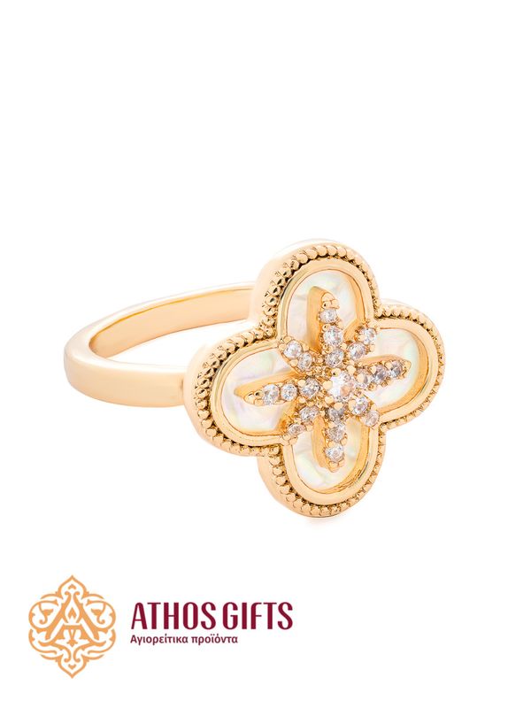 Ring with mother-of-pearl and glass rhinestones.