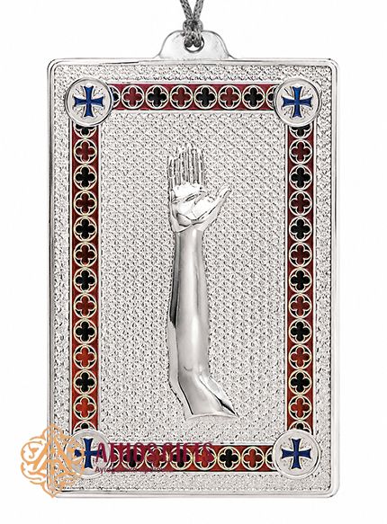 Metal Tama with an image of a hand.
