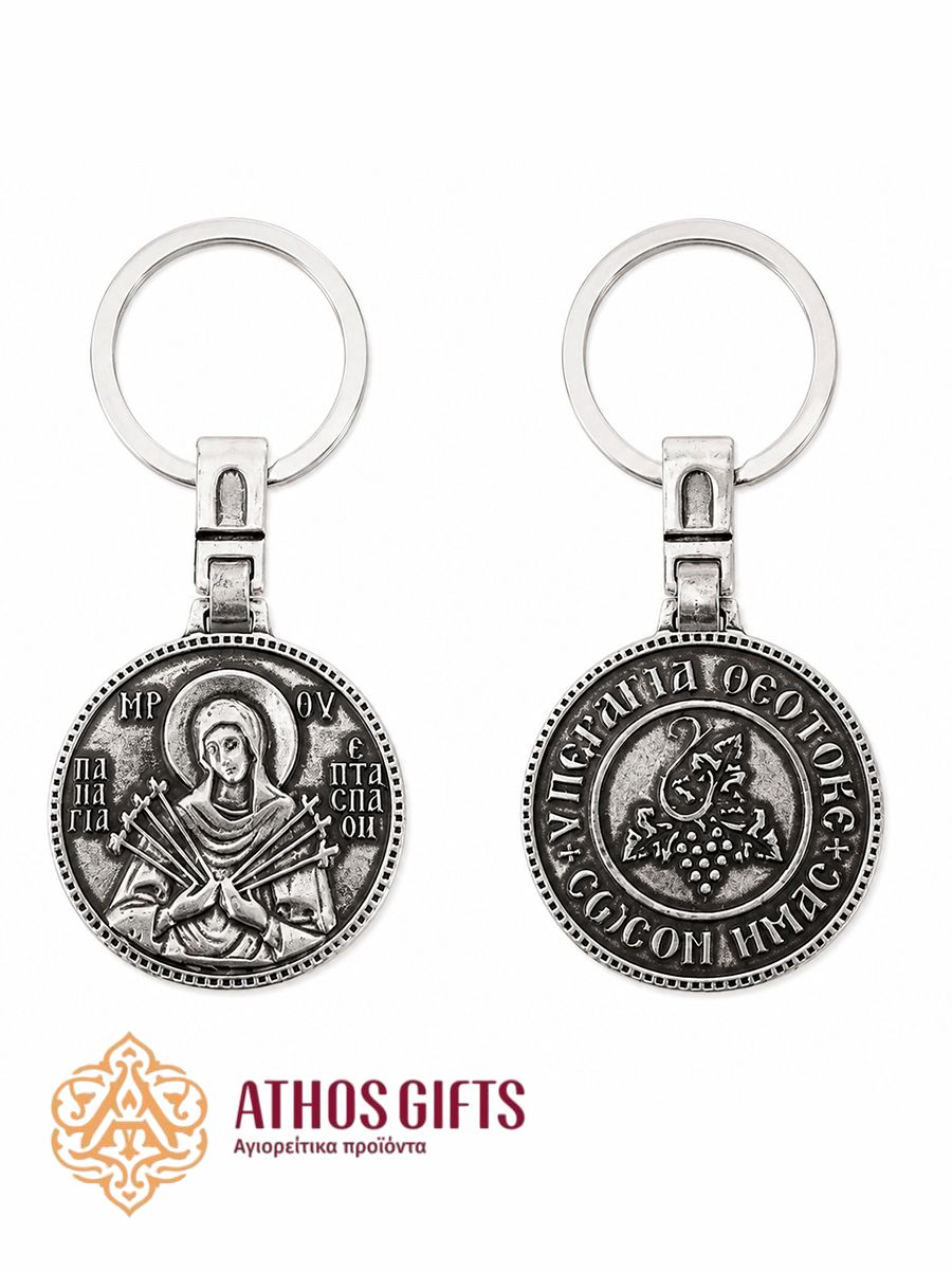 Metal keychain for keys or a car with a relief icon of the Mother of God "Seven Arrows".