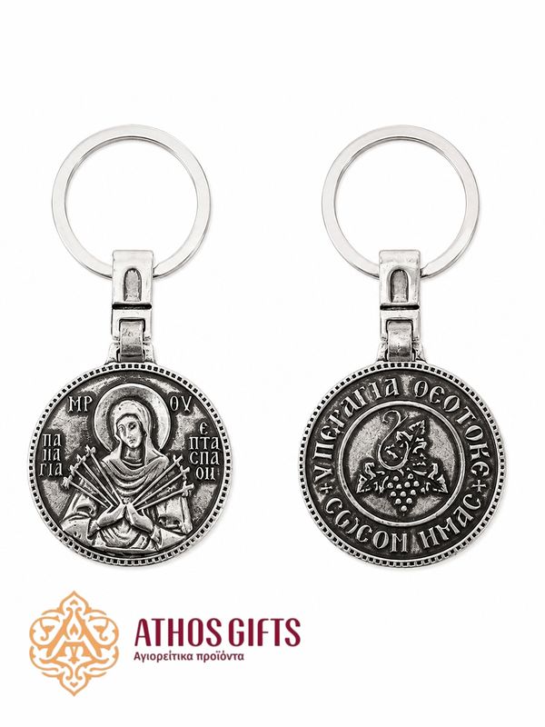 Metal keychain for keys or a car with a relief icon of the Mother of God "Seven Arrows".
