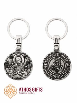Metal keychain for keys or a car with a relief icon of the Mother of God "Seven Arrows".
