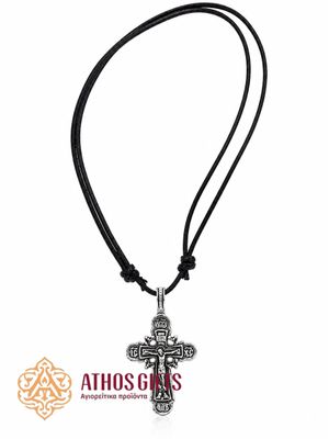 Metal cross on an adjustable cord featuring the Crucifixion of Jesus Christ.