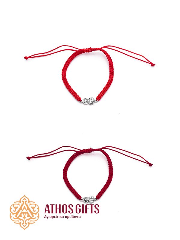 Braided bracelet with a silver icon of Saint Nicholas.