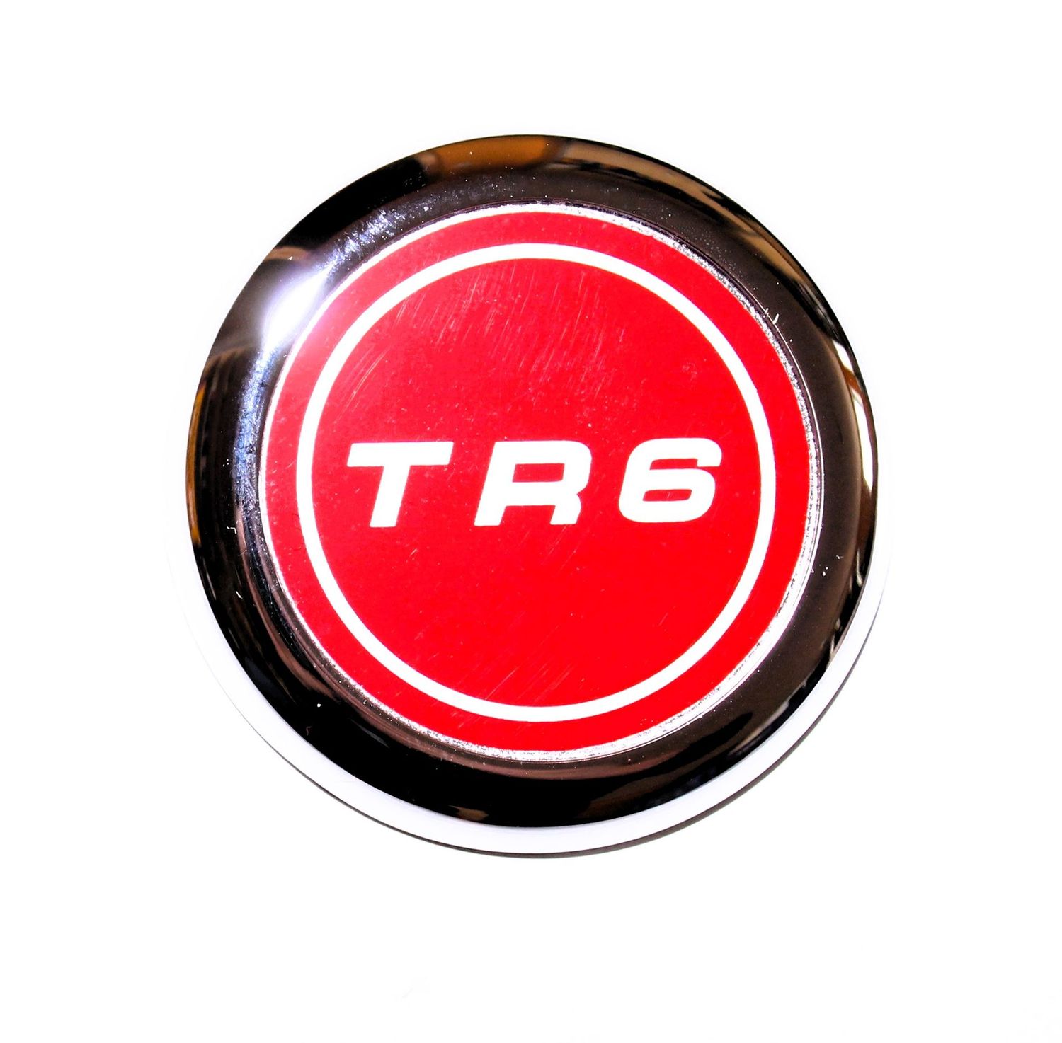 EMBLEM "TR6" ROT AUF RADKAPPE TR6 AB CP/CC50001