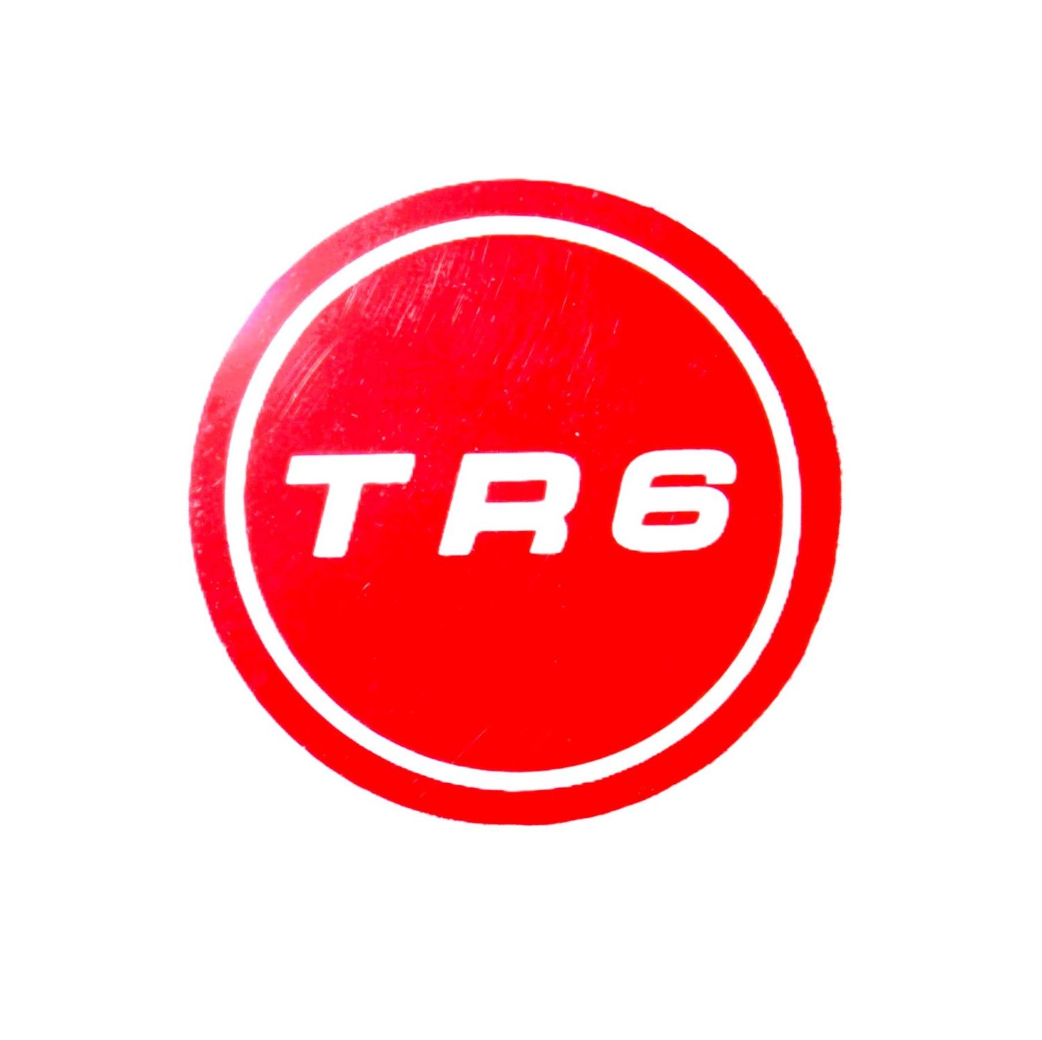 AUFKLEBER "TR6" ROT AUF EMBLEM RADKAPPE TR6 AB CP/CC50001