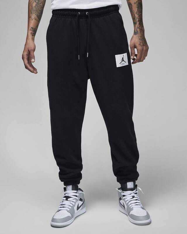 Pantaloni Jordan Neri Unisex Cotone Club Fleece Spazzolato Trackpants elastico alla caviglia Essential Flight Patch  Nero Black  art.  DQ7468 010
