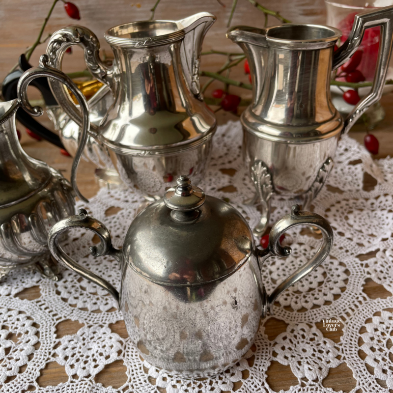 Milk jug with decorated feet