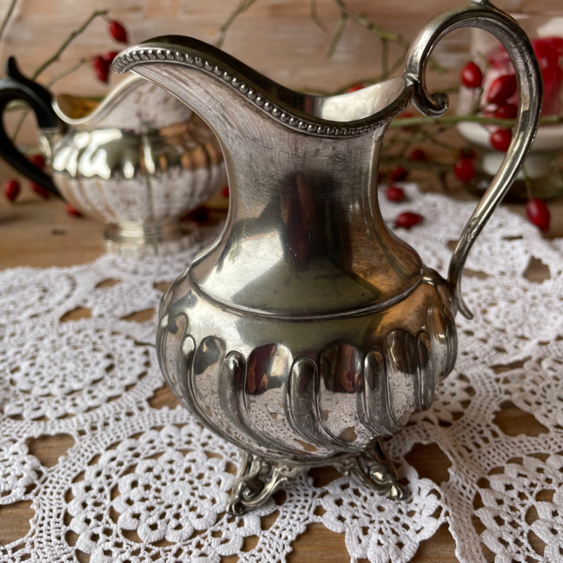 Silver milk jug
