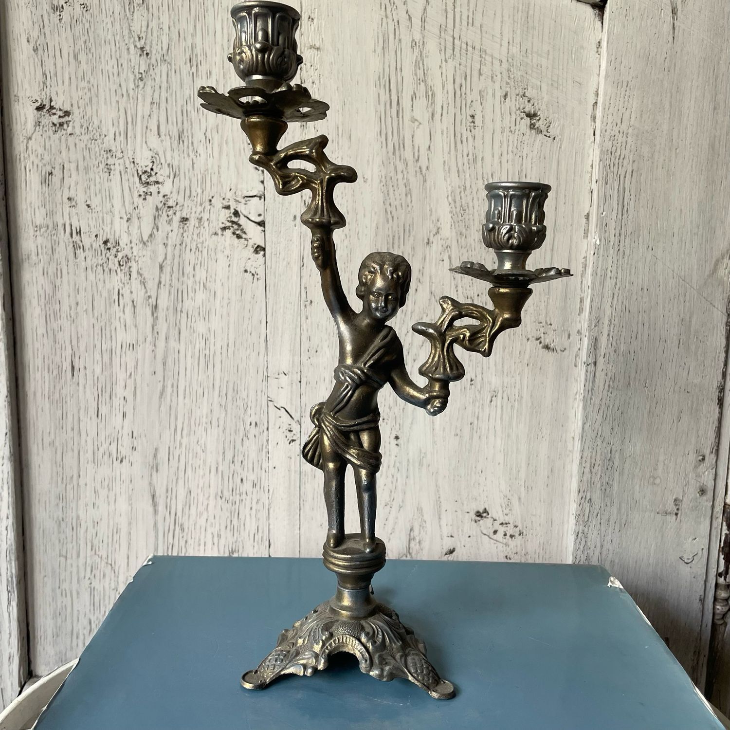 Vintage candelabrum with cherub