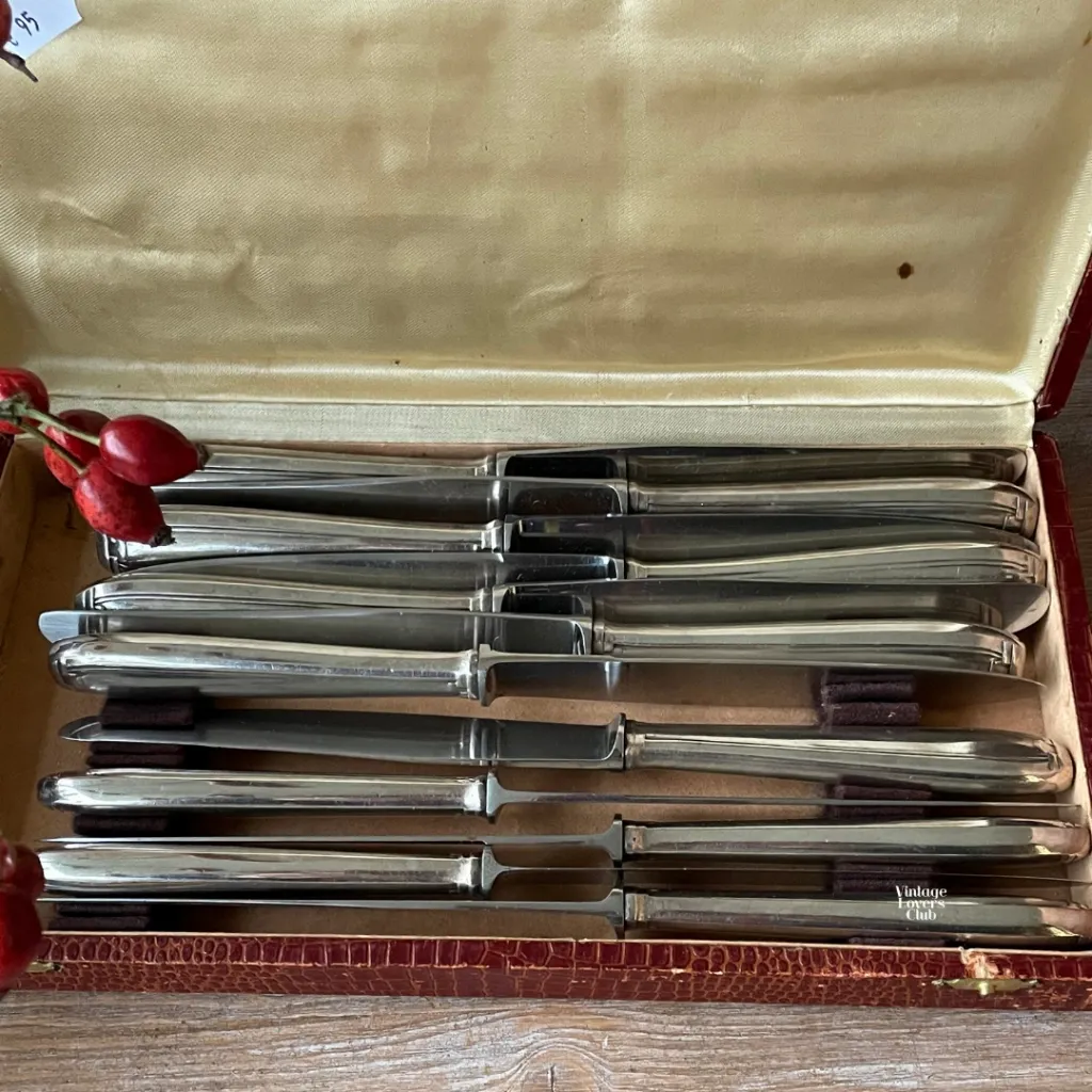 Set of 12 Steel and Silver Table Knives