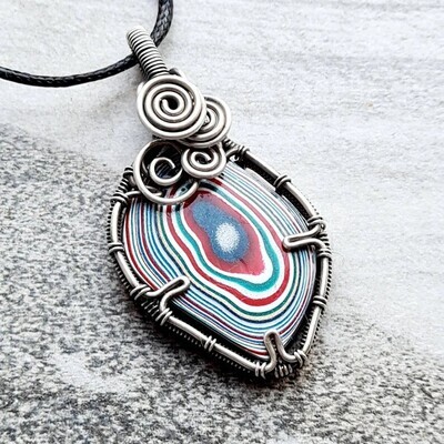 RARE Metallic Kenworth Fordite in sterling silver with necklace.