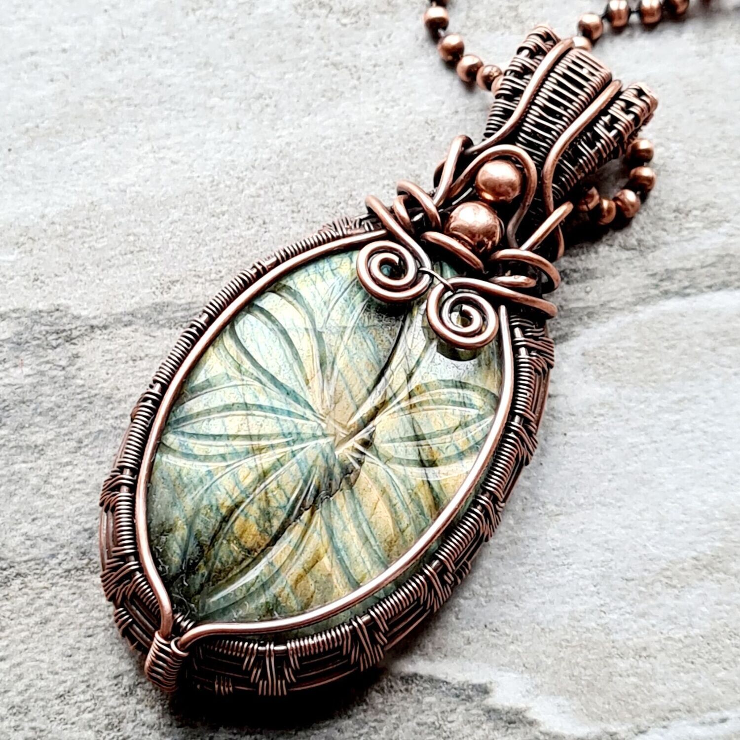 Carved Labradorite with beads pendant with chain.