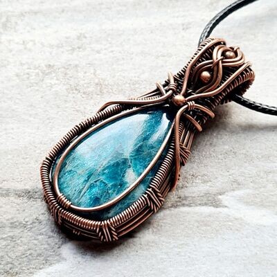 Apatite with beads pendant with chain.