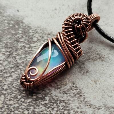 Faceted Aurora Opal pendant with chain.