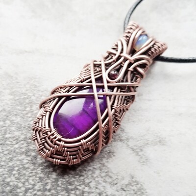 Purple Coloured Labradorite with Garnet and WELO Opal accent pendant with chain.