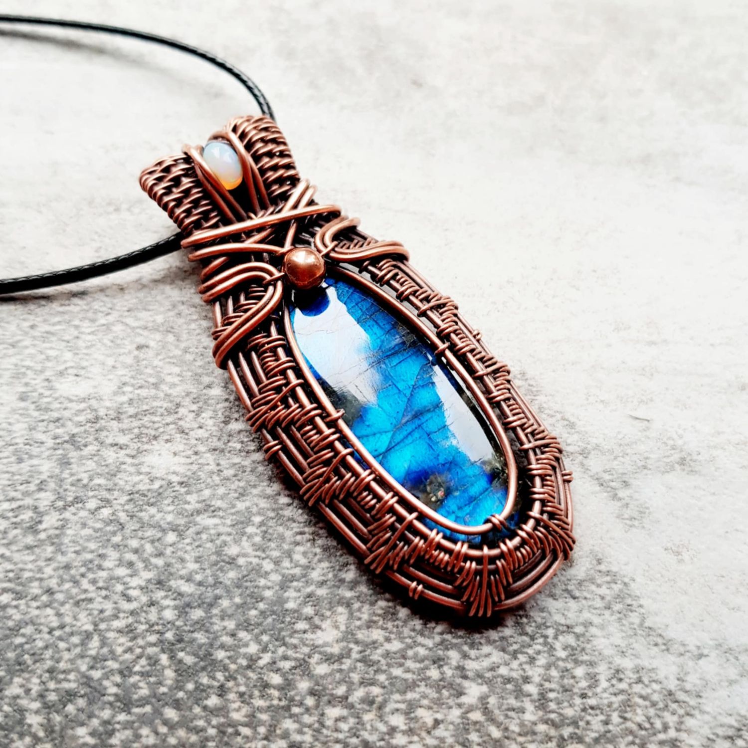 Labradorite and AAA WELO Opal accent pendant with chain.