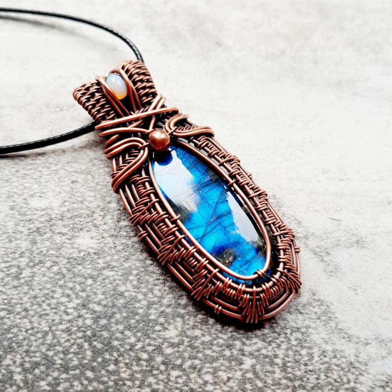 Labradorite and AAA WELO Opal accent pendant with chain.