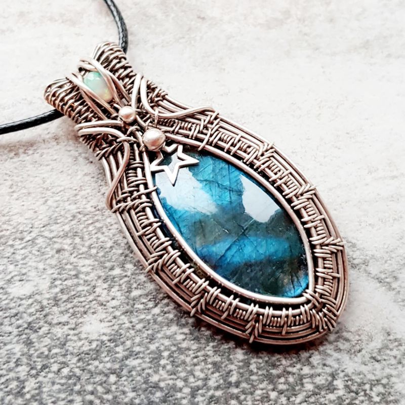 Flashy blue large Labradorite with AAA WELO Opal accent and sterlind silver star pendant with chain.