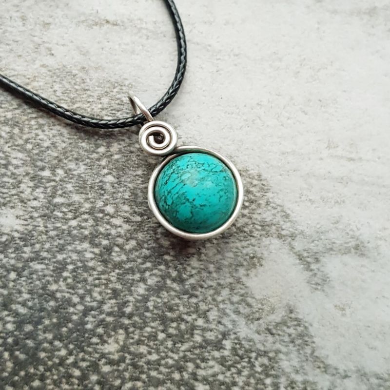 Turquoise bead pendant with chain.