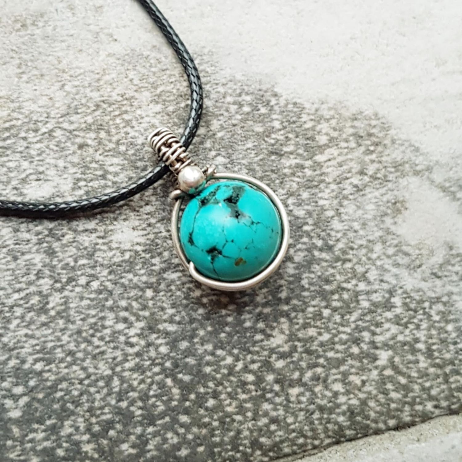 Turquoise bead pendant with chain.