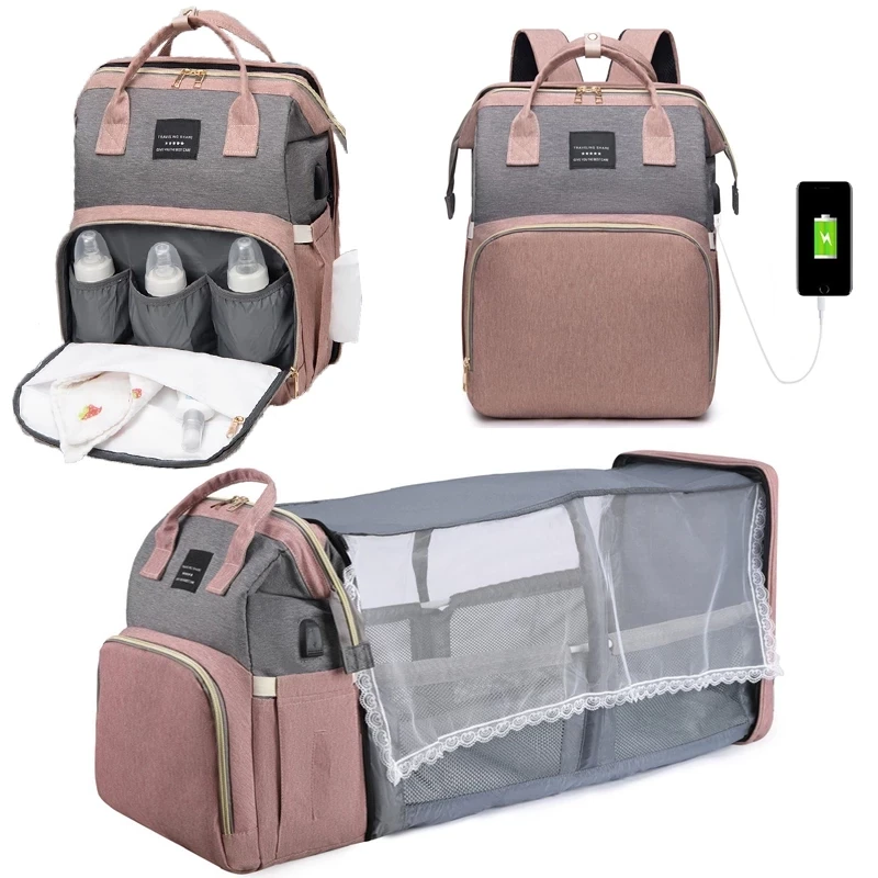 Diaper bag with a foldable bed