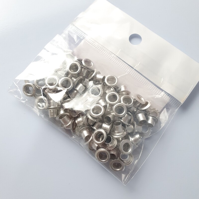Eyelets Color Plata con arandelas Paq. 50 pzas.