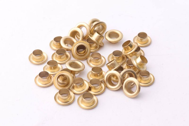 Eyelets Champagne con arandelas 50 Psz