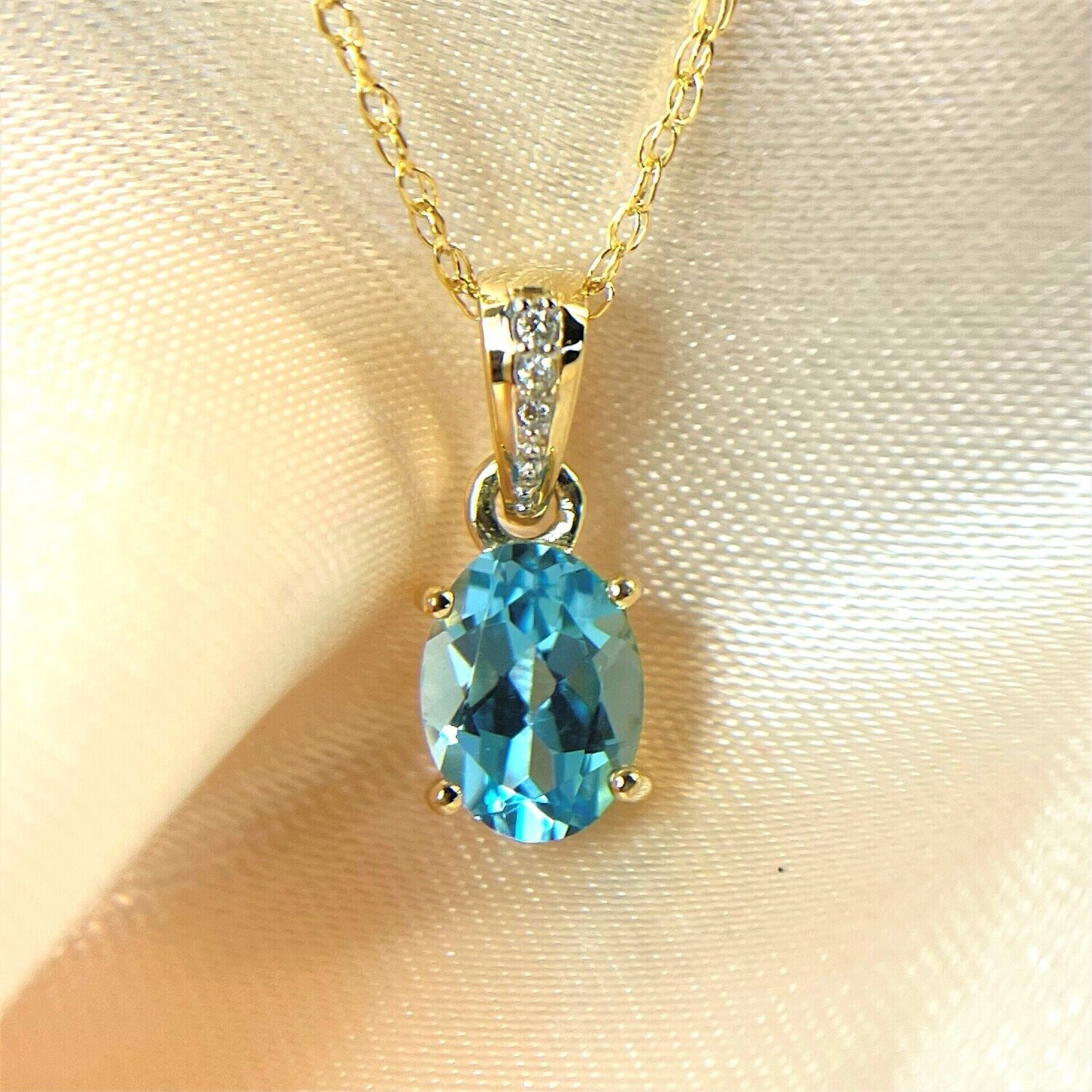Wilkerson B374588  14k Yellow Gold Blue Topaz & Diamond Necklace