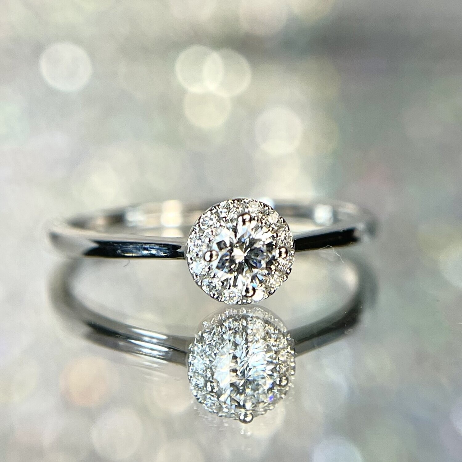 24133043  14k White Gold .20cttw Diamond Halo Ring