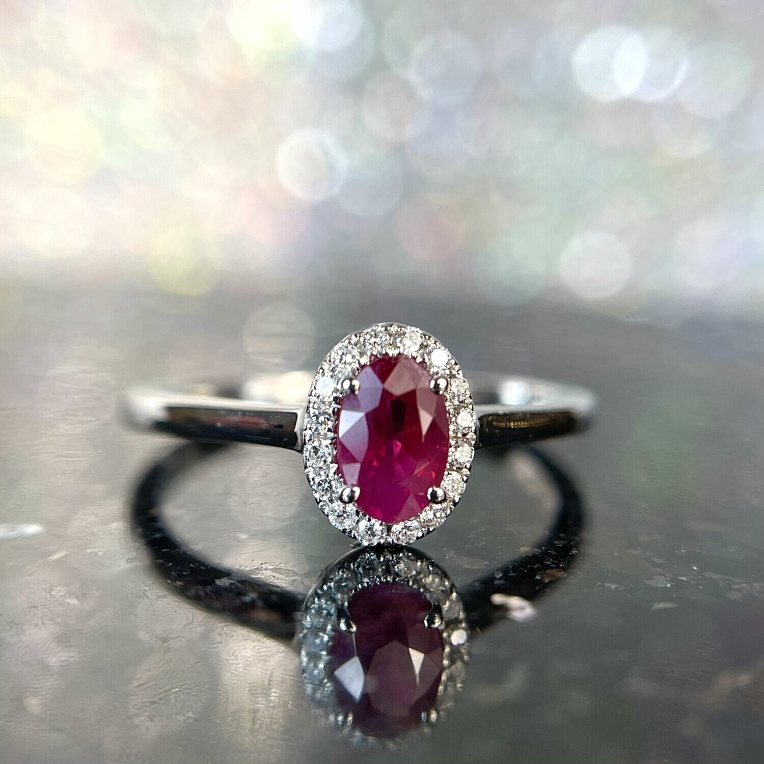 25041583  14k White Gold Ruby & Diamond Halo Style Ring