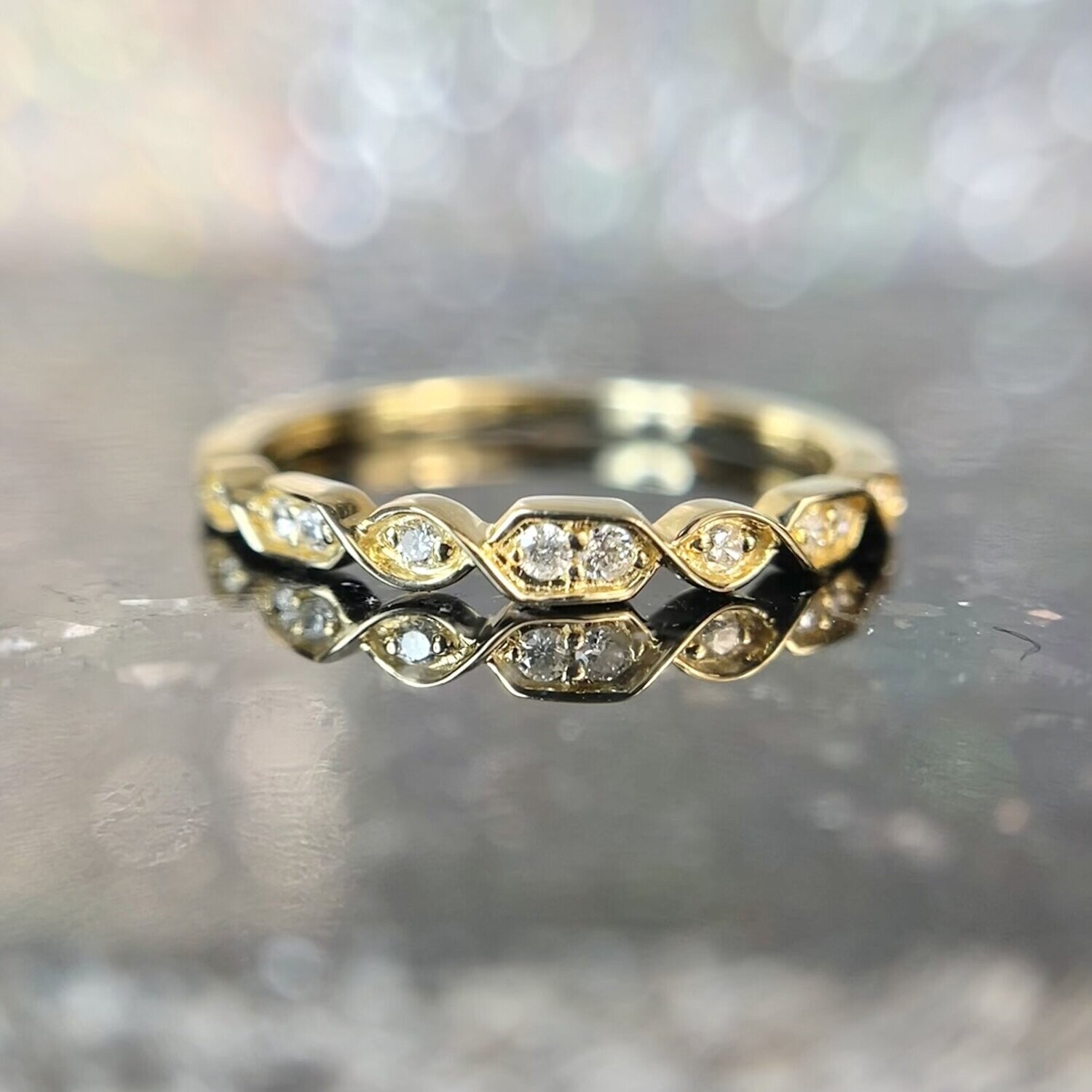 24243644  14k Yellow Gold .08ct total weight Diamond Band