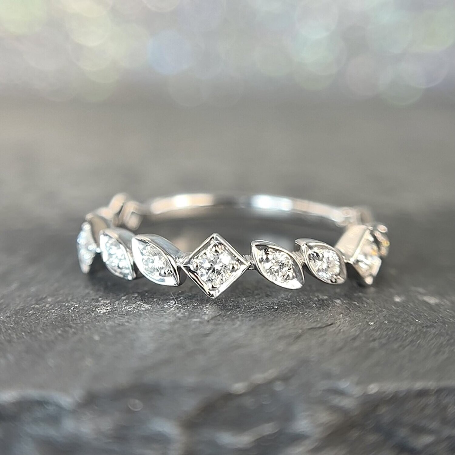 25196924  14k White Gold .18ct total weight Diamond Band