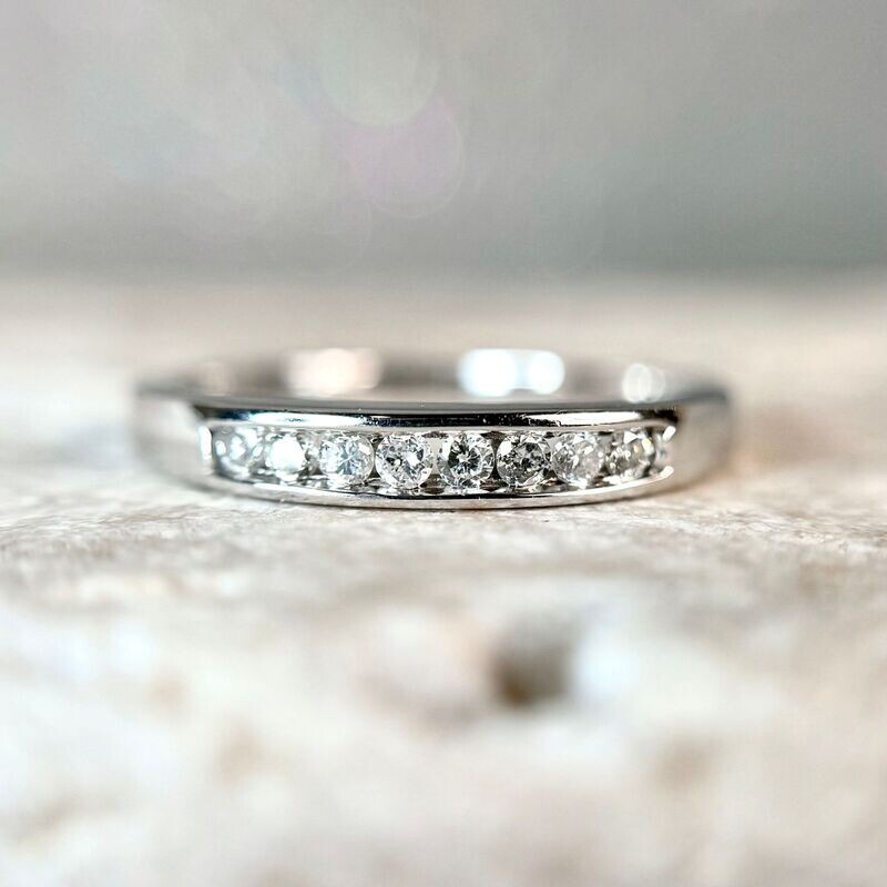24762080  14k White Gold 1/10 cttw Diamond Channel Band